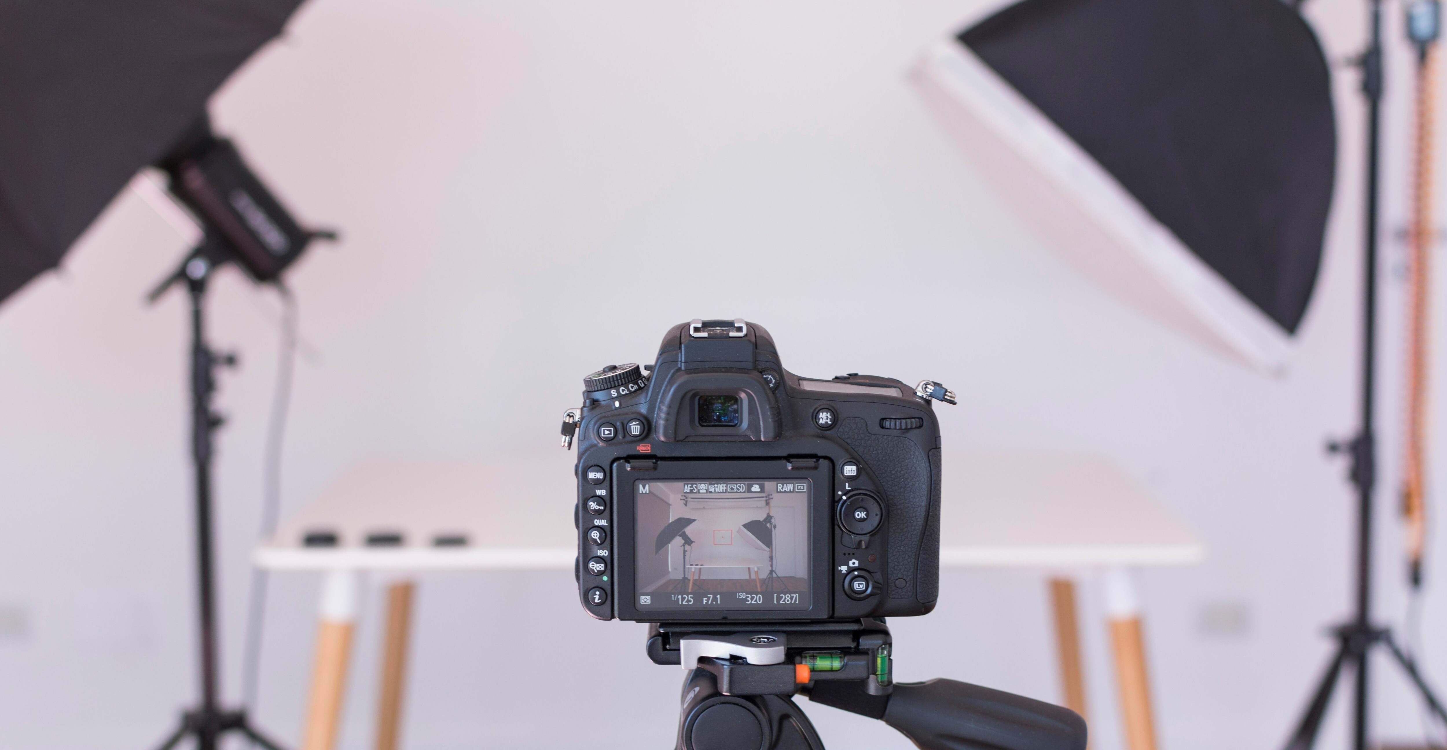 Professional camera pointed at a table