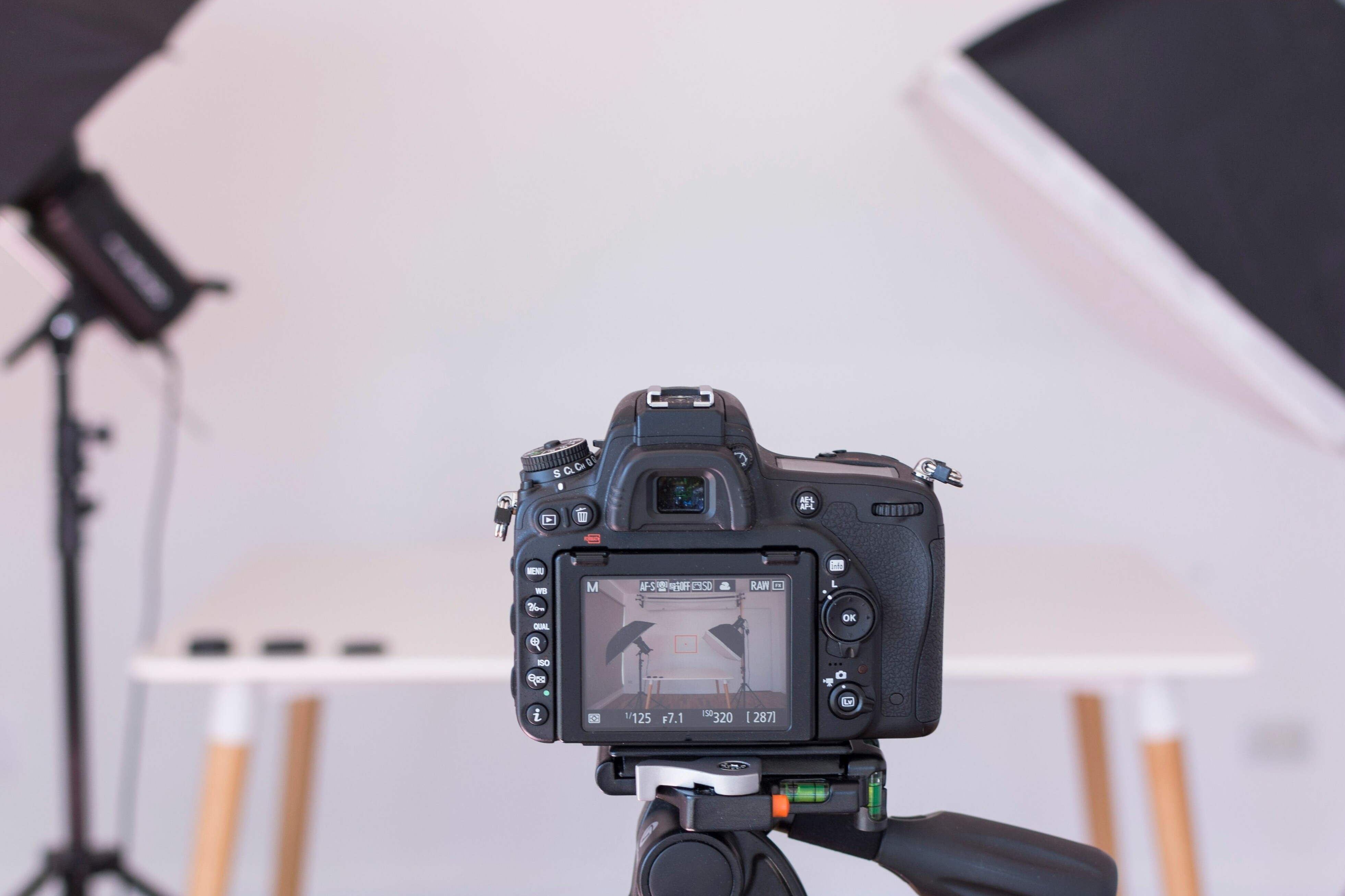 Professional camera pointed at a table