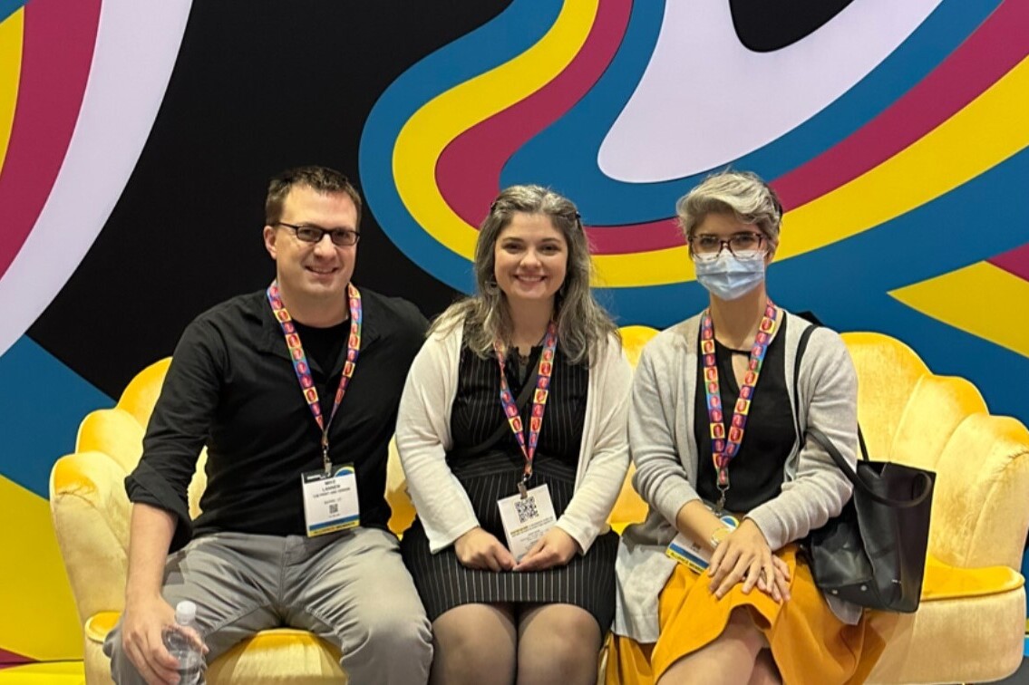 Mike, Mollie and Marilyn on the yellow couch at PRINTING United Expo 2022