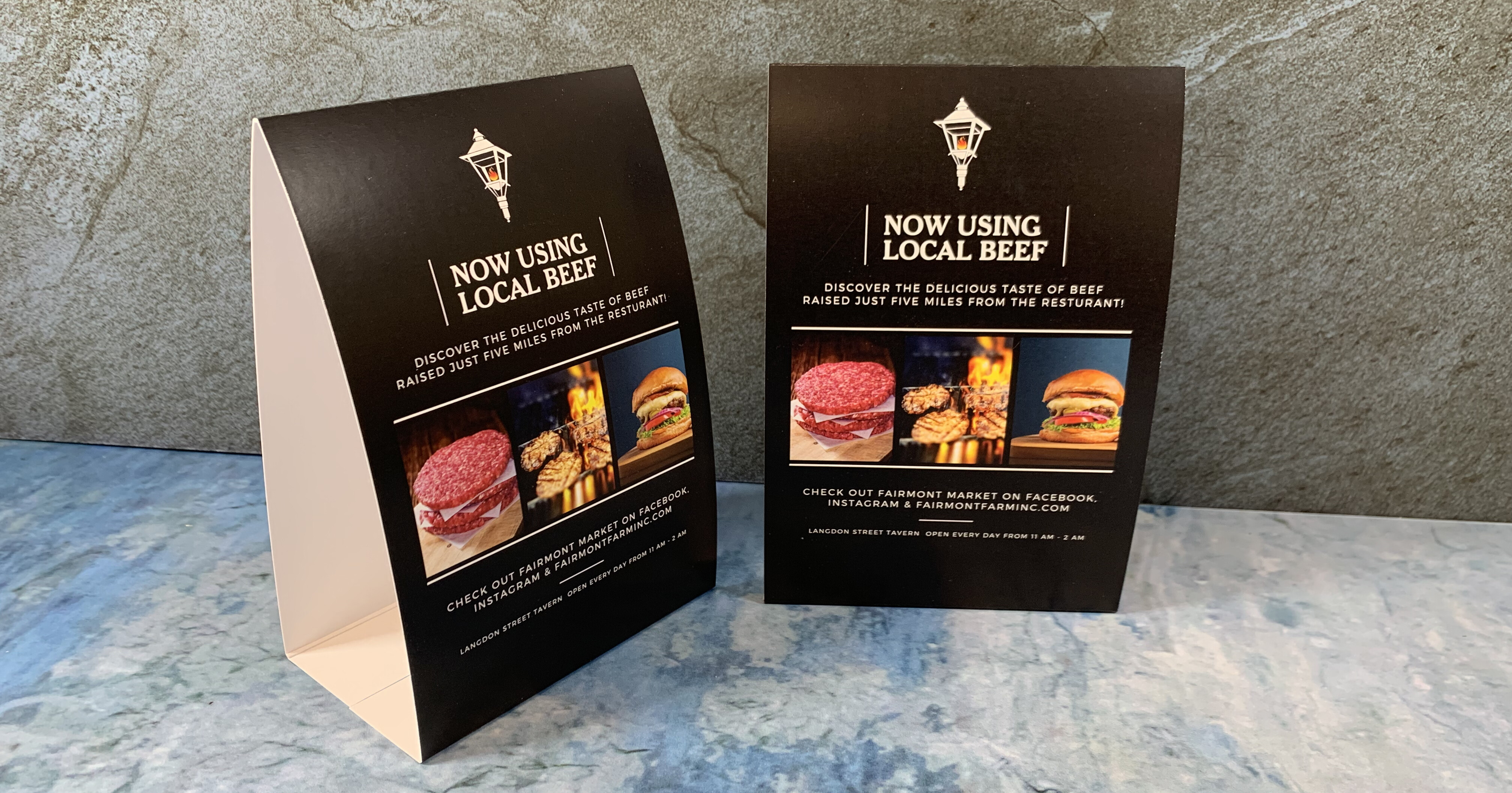 Restaurant table tent featuring local beef with burger and grill images