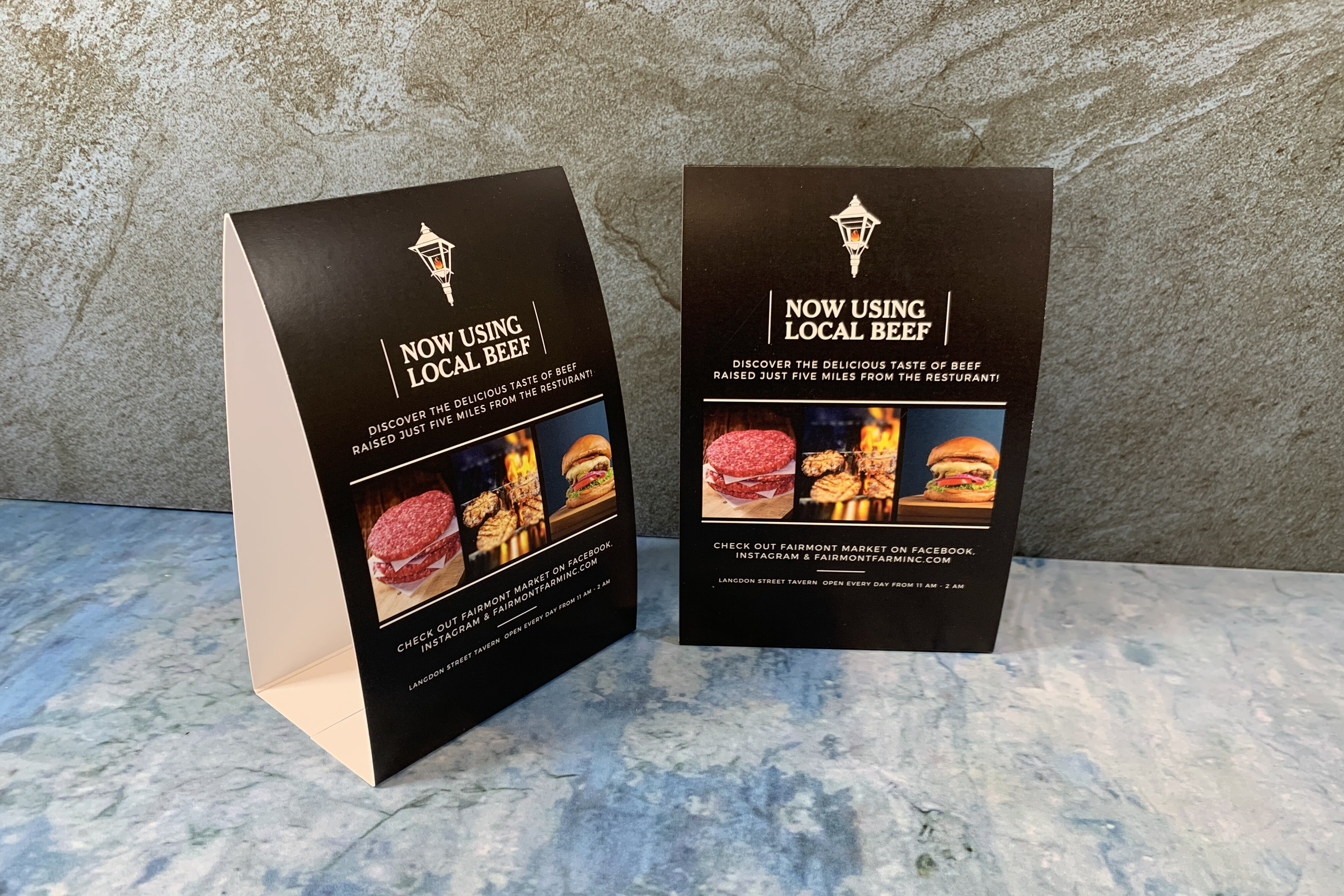 Restaurant table tent featuring local beef with burger and grill images