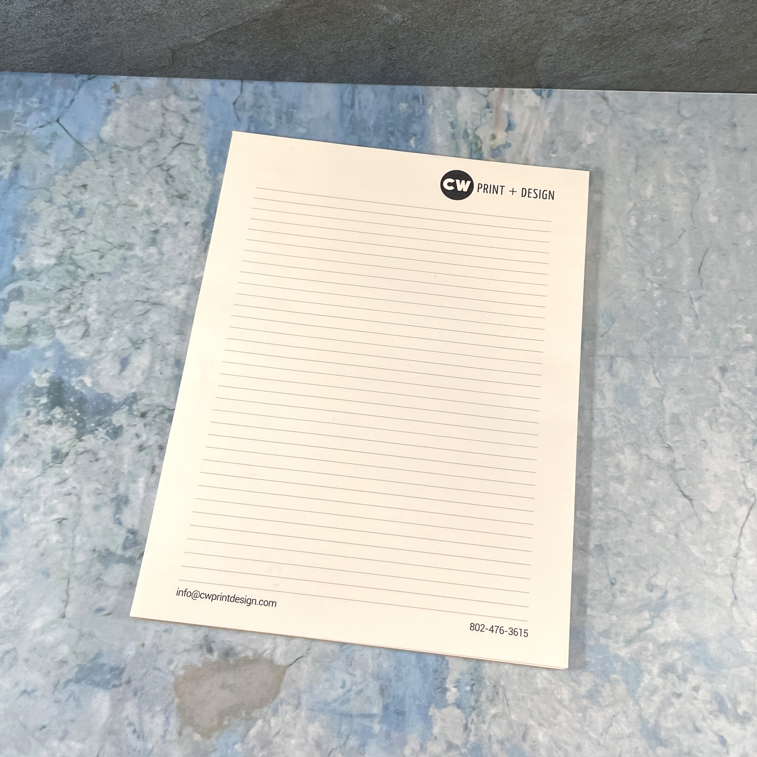 Black and White printed notepad - giveaway promotional item.